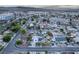 Aerial view showcases the neighborhood with mature trees and well-maintained homes at 605 N 4Th St, Las Vegas, NV 89101