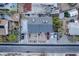 An aerial view shows the well maintained roof and yard space and multiple parking spots at 615 N 4Th St, Las Vegas, NV 89101