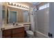 Bathroom with a shower/tub combo and a single sink vanity and marble countertop at 6242 Halehaven Dr, Las Vegas, NV 89110