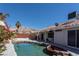 Backyard pool with stunning mountain views, creating a picturesque setting for relaxation and recreation at 6242 Halehaven Dr, Las Vegas, NV 89110