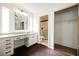 Bathroom features double sinks, vanity area, and walk-in shower with glass door at 6330 Spring Meadow Dr, Las Vegas, NV 89103