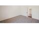 Bedroom with neutral carpet, fresh paint, and closet with doors at 6330 Spring Meadow Dr, Las Vegas, NV 89103