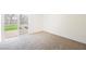 Carpeted bedroom with sliding glass door providing backyard access at 6330 Spring Meadow Dr, Las Vegas, NV 89103