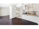 Bright kitchen showcasing granite countertops, stainless steel appliances, and hardwood floors at 6330 Spring Meadow Dr, Las Vegas, NV 89103