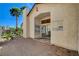 Backyard patio area with mature landscaping and direct access to inside at 6521 Faith Peak Dr, Las Vegas, NV 89108