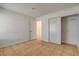 Bedroom featuring tiled floors, closet, and neutral decor create a bright and inviting space at 6521 Faith Peak Dr, Las Vegas, NV 89108