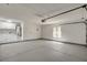 Spacious two car garage with water heater and storage cabinets at 6521 Faith Peak Dr, Las Vegas, NV 89108