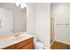 Bathroom featuring a glass door shower and wood vanity at 7119 Wolf Rivers Ave, Las Vegas, NV 89131