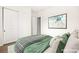 Staged bedroom featuring a closet and modern decor at 7119 Wolf Rivers Ave, Las Vegas, NV 89131