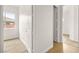 View from bedroom through hallway and tiled floors at 7119 Wolf Rivers Ave, Las Vegas, NV 89131