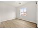 Bright bedroom with a window, providing natural light and outside views at 7119 Wolf Rivers Ave, Las Vegas, NV 89131