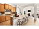Well-equipped kitchen featuring stainless steel appliances and a large island with bar stool seating at 7119 Wolf Rivers Ave, Las Vegas, NV 89131