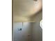 Empty laundry room featuring white walls, a storage shelf, and washer and dryer hookups at 7228 Chic Ave, Las Vegas, NV 89129