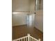 Open living room with tile flooring, high ceilings, and stairway to the second floor at 7228 Chic Ave, Las Vegas, NV 89129