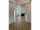 Spacious living room featuring tile floors, fireplace and sliding doors at 7228 Chic Ave, Las Vegas, NV 89129