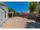 Spacious backyard with a covered patio, offering great potential for outdoor living and entertaining at 831 Purple Sage Ter, Henderson, NV 89015