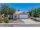 Well-maintained home featuring mature trees, low-maintenance landscaping, and an attached two-car garage at 831 Purple Sage Ter, Henderson, NV 89015