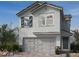 Charming two-story home features a two-car garage and stylish architectural details at 9082 Rivington Ave, Las Vegas, NV 89148