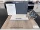 Upgraded kitchen finish samples featuring cabinets, paint, a quartz countertop and a stylish faucet at 9082 Rivington Ave, Las Vegas, NV 89148