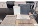 A collection of kitchen finish samples including cabinets, quartz countertop, and faucet at 9082 Rivington Ave, Las Vegas, NV 89148