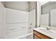 Full bathroom featuring bathtub-shower combo, vanity and ample lighting at 9271 Martel Ave, Las Vegas, NV 89148