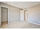 Bedroom with neutral carpet, closet, and ensuite bathroom at 9271 Martel Ave, Las Vegas, NV 89148