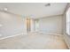 Spacious carpeted bedroom with walk-in closet and neutral decor at 9271 Martel Ave, Las Vegas, NV 89148