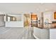 Open kitchen design with stainless steel appliances, granite counters, and wood cabinets at 9271 Martel Ave, Las Vegas, NV 89148