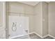 Convenient laundry room with wire shelving and vinyl flooring, ready for appliances at 9271 Martel Ave, Las Vegas, NV 89148
