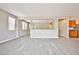 Expansive living space with plank floors, neutral walls, and an open layout at 9271 Martel Ave, Las Vegas, NV 89148