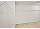 Spacious walk-in closet with carpeted floor and white walls with wire shelving for optimal storage at 9271 Martel Ave, Las Vegas, NV 89148