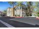 Beautiful two-story building featuring a two-car garage and well-maintained landscaping in a community setting at 10001 Peace Way # 1250, Las Vegas, NV 89147