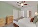 Bedroom showcasing natural light, closet space, and an attached bathroom for convenience at 10001 Peace Way # 1250, Las Vegas, NV 89147