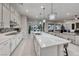 Gourmet kitchen with a large center island, quartz countertops, and an open floor plan at 101 Mirage View Dr, Henderson, NV 89011