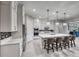 Bright, open kitchen featuring a large island with seating and modern appliances at 101 Mirage View Dr, Henderson, NV 89011