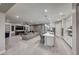 Spacious kitchen with a large island, stainless steel appliances, and an open layout to the living area at 101 Mirage View Dr, Henderson, NV 89011