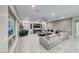 Spacious living room featuring a large sectional sofa and modern entertainment center at 101 Mirage View Dr, Henderson, NV 89011