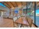 Clubhouse meeting space features wood floors, large windows, stone pillars and comfortable seating at 101 Mirage View Dr, Henderson, NV 89011