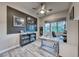 Home office featuring a ceiling fan, built-in shelving and a window with a view at 101 Mirage View Dr, Henderson, NV 89011