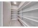 Walk-in pantry with built-in shelving, providing ample storage space and organization at 101 Mirage View Dr, Henderson, NV 89011