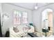 Bright living room with a quilted couch and stylish decor at 10667 Olympic Pine Dr, Las Vegas, NV 89135