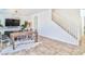 Spacious living area with dining, and stairway access at 10667 Olympic Pine Dr, Las Vegas, NV 89135