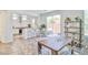 Open concept layout with kitchen, dining and outdoor access at 10667 Olympic Pine Dr, Las Vegas, NV 89135