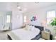 Bright main bedroom with king bed and modern decor at 10667 Olympic Pine Dr, Las Vegas, NV 89135