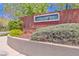 Community entrance sign that reads Westwood with desert landscaping around the sign at 10667 Olympic Pine Dr, Las Vegas, NV 89135