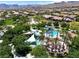 Aerial view showcasing the community pool, lush landscaping, and recreational areas at 11856 Barona Mesa Ave, Las Vegas, NV 89138