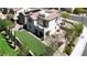 Aerial view of backyard with artificial turf, small courtyard with stone paver surround, and upper level deck at 11856 Barona Mesa Ave, Las Vegas, NV 89138