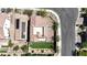 Overhead view of the tile roof, solar panels, small courtyard, and manicured artificial turf backyard at 11856 Barona Mesa Ave, Las Vegas, NV 89138