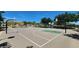 Community basketball court ready for games with multiple hoops and well-maintained surface at 11856 Barona Mesa Ave, Las Vegas, NV 89138