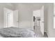 Bright bedroom with a walk-in closet and light gray color palette at 11856 Barona Mesa Ave, Las Vegas, NV 89138